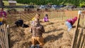 Children Playing in a Pile of Hay